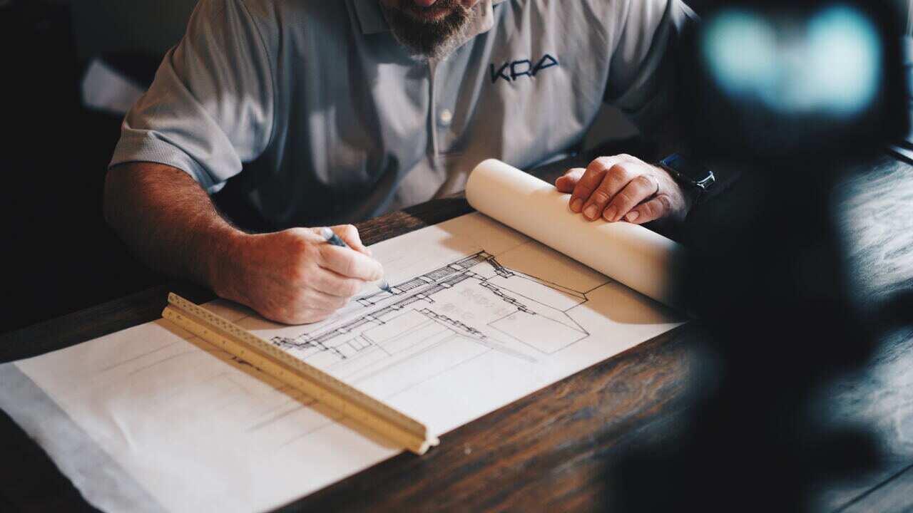 Architect drawing plans