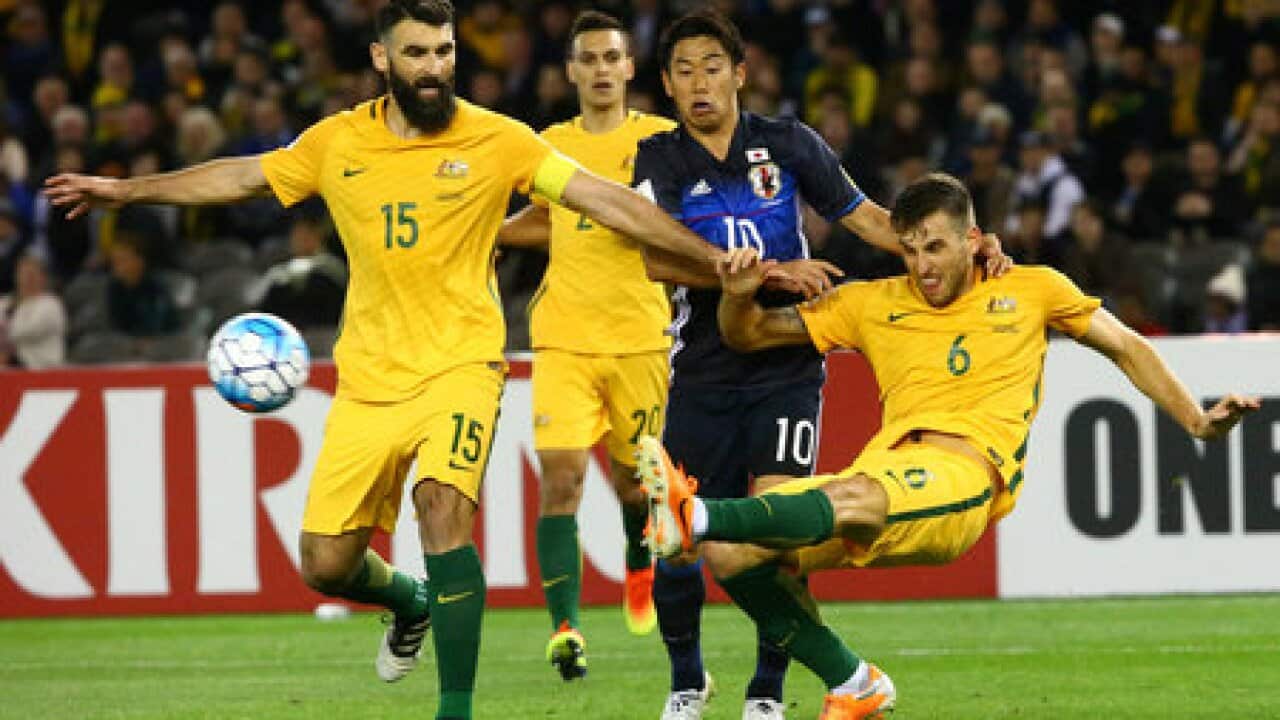 Jedinak penalty secures draw for Australia against Japan