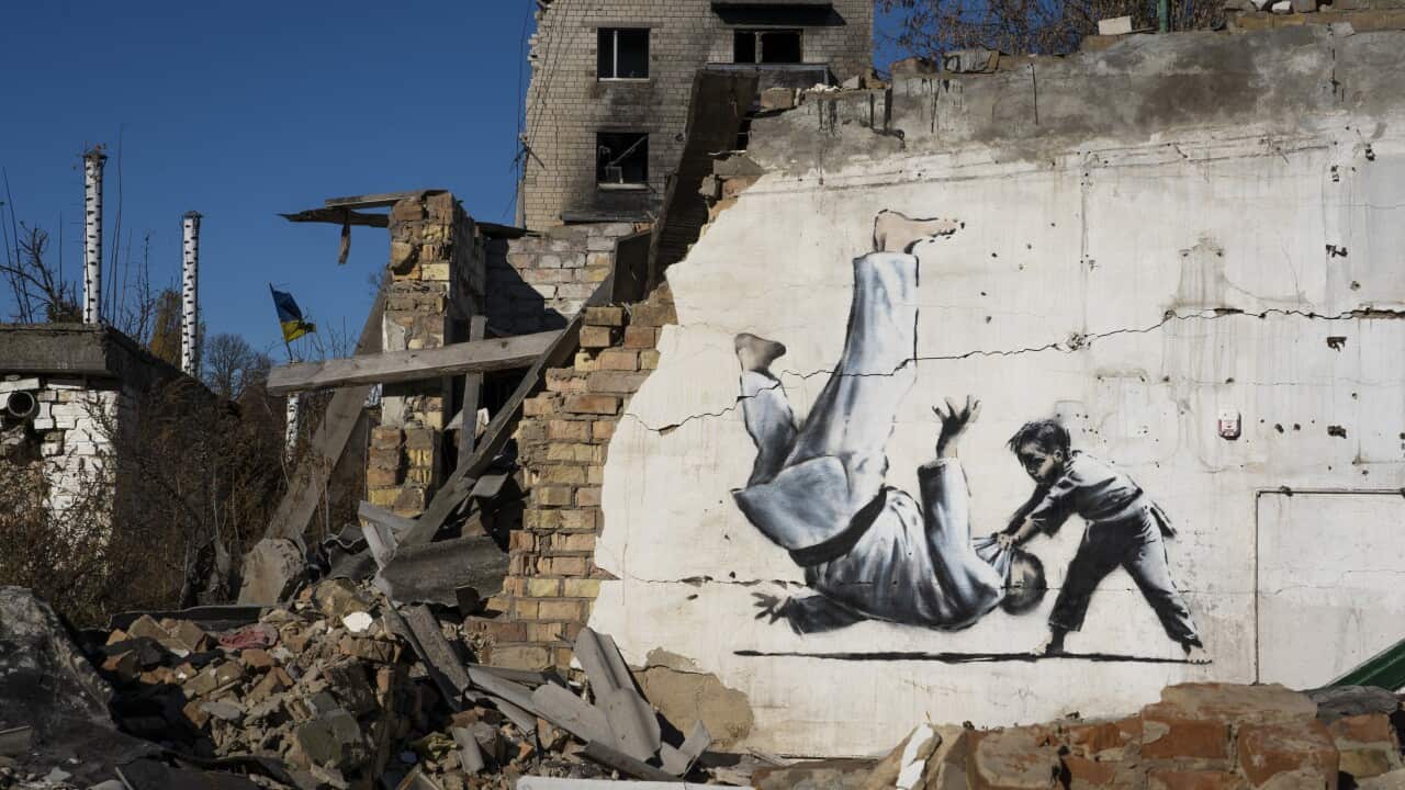 A photo of a mural in war-torn Ukraine