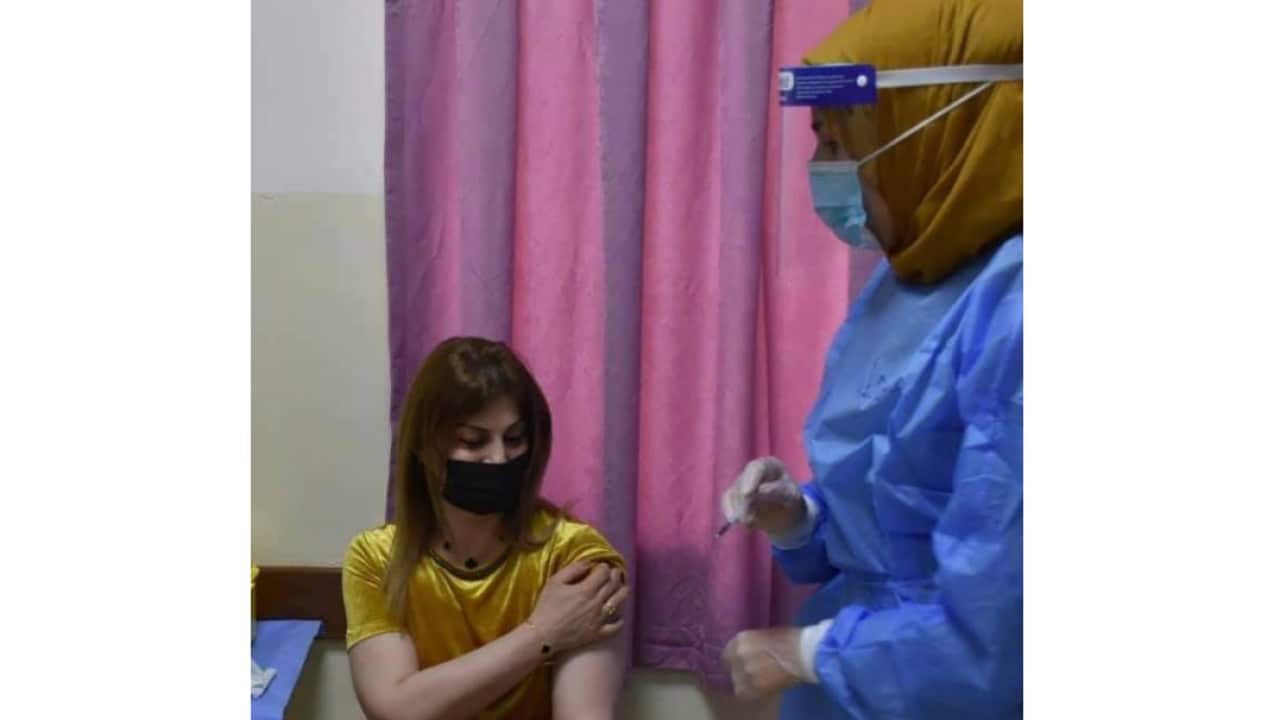 Woman getting Covid vaccine