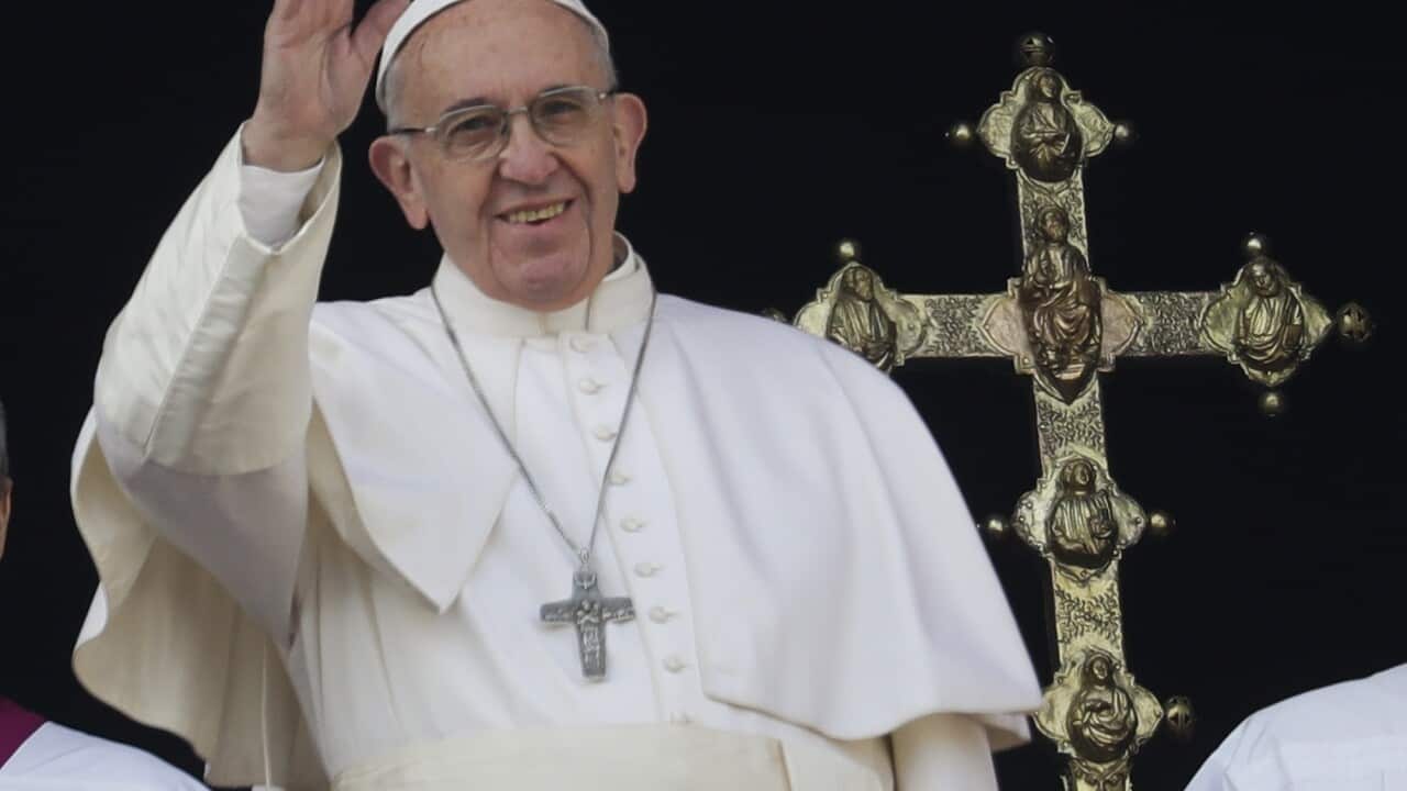 Pope Francis delivers the Urbi et Orbi (Latin for ' to the city and to the world' ) Christmas' day blessing from the main balcony of St. Peter's Basilica at the Vatican, Sunday, Dec. 25, 2016. (AP Photo/Alessandra Tarantino)