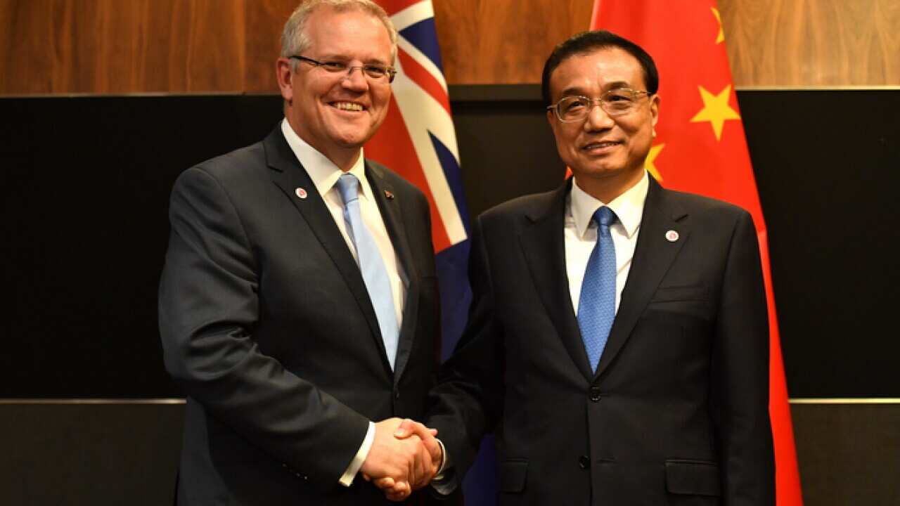 Prime Minister Scott Morrison, left, and Chinese premier Li Keqiang