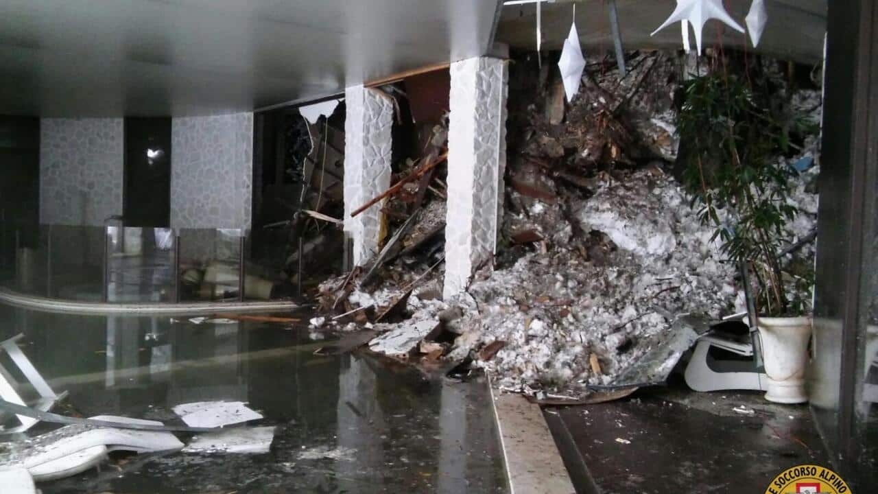 The interior of the Rigopiano Hotel is destroyed by an avalanche in Farindola, Italy, early Thursday, Jan. 19, 2017.