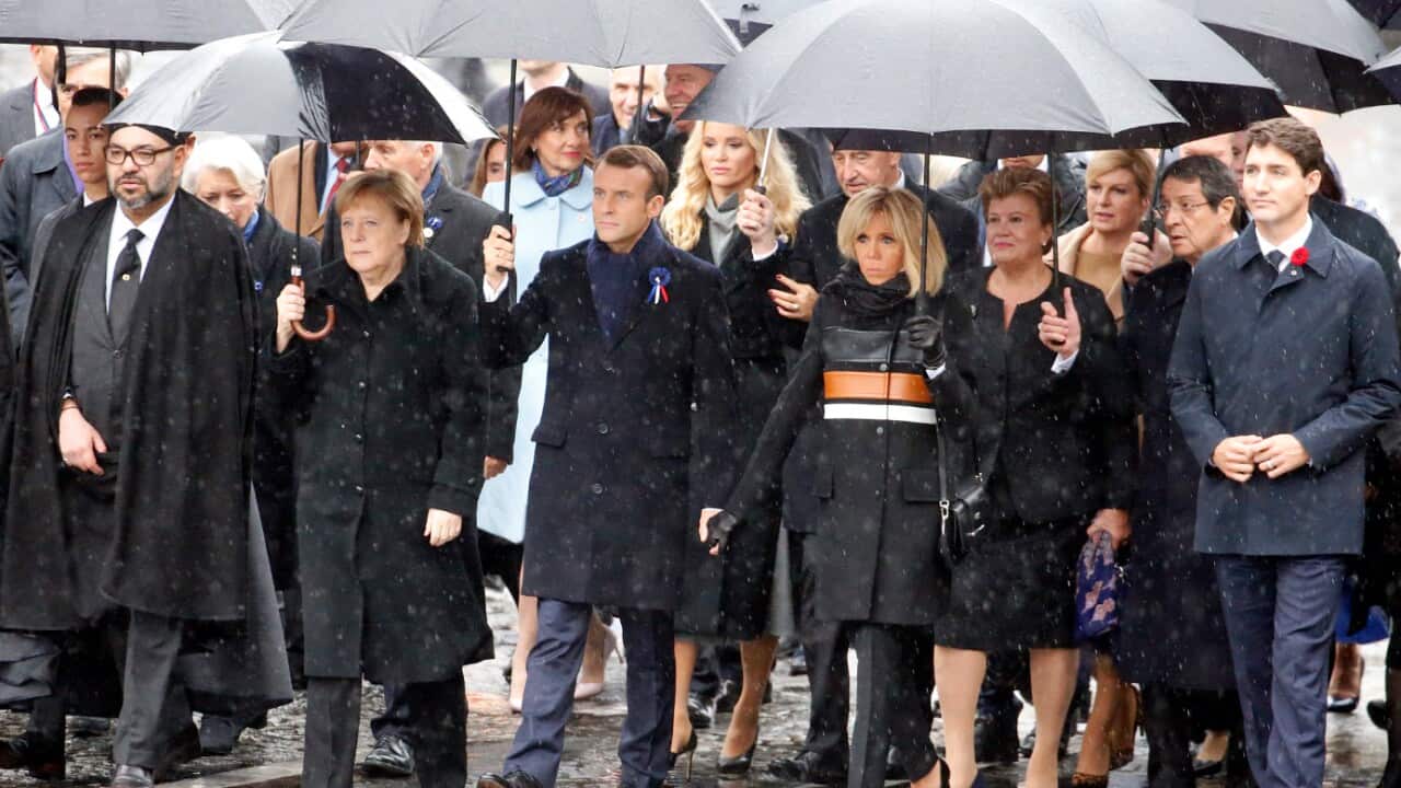 (L-R) Prince Moulay El Hassan, King of Marocco Mohammed VI, German Chancellor Angela Merkel, French President Emmanuel Macron, his wife Brigitte Macron and Canada's Prime Minister Justin Trudeau arrive to attend the international ceremony of the Armistic