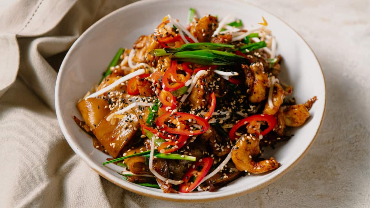 Stir-fried rice noodles, dark soy and garlic chives