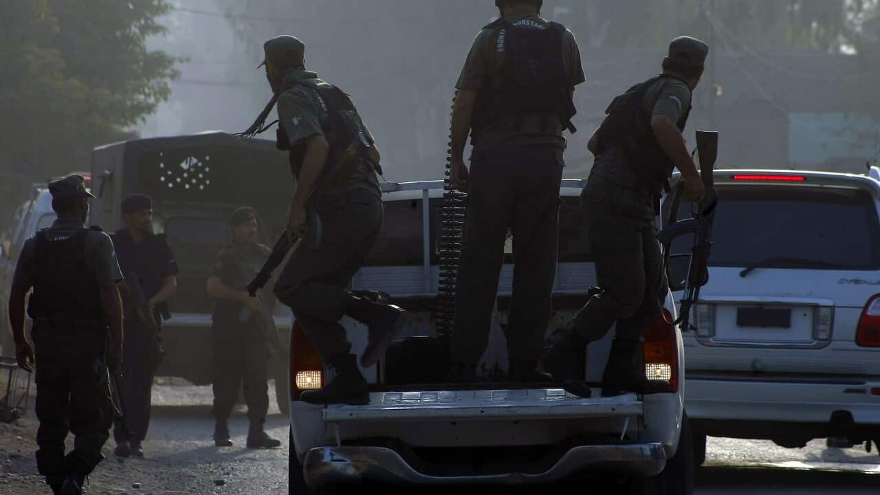 Pakistani commandos arrive at an air force base in Peshawar, Pakistan. (AP)