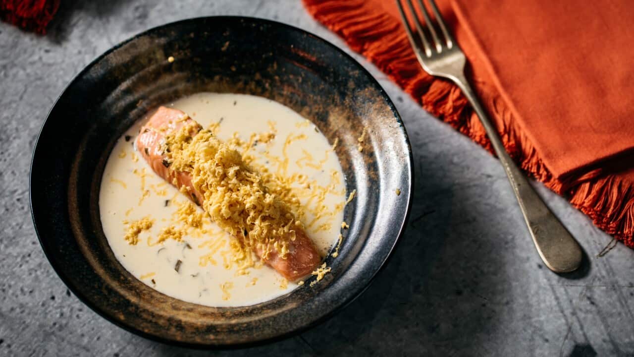 Butter poached salmon, topped with shaved sea urchin