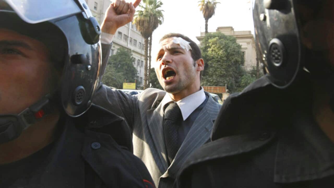 egypt_suit_protest_110128_B_getty_1326648664
