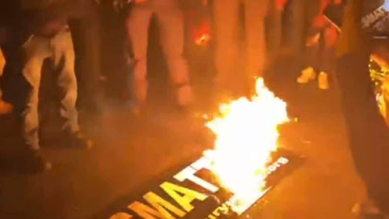 Videos on Twitter purported to show far-right protesters setting fire to a Black Lives Matter sign in Washington DC.