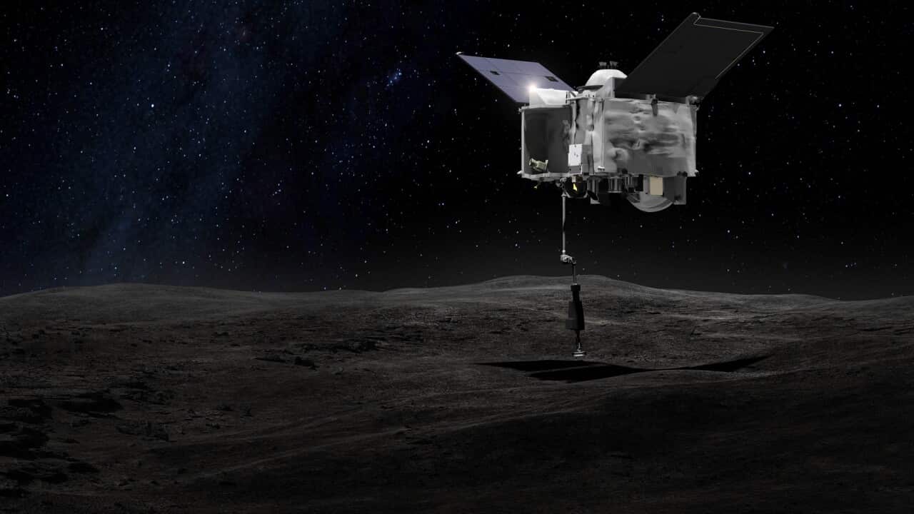OSIRIS-REx grabs a sample from the surface of Bennu (Artist's impression)