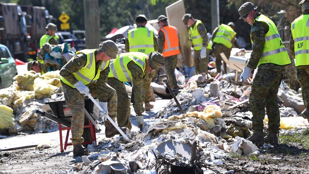 Queensland is looking at a damage bill of more than $2.5 billion following the flood disaster that has claimed 13 lives. (AAP Image/Darren England) NO ARCHIVING