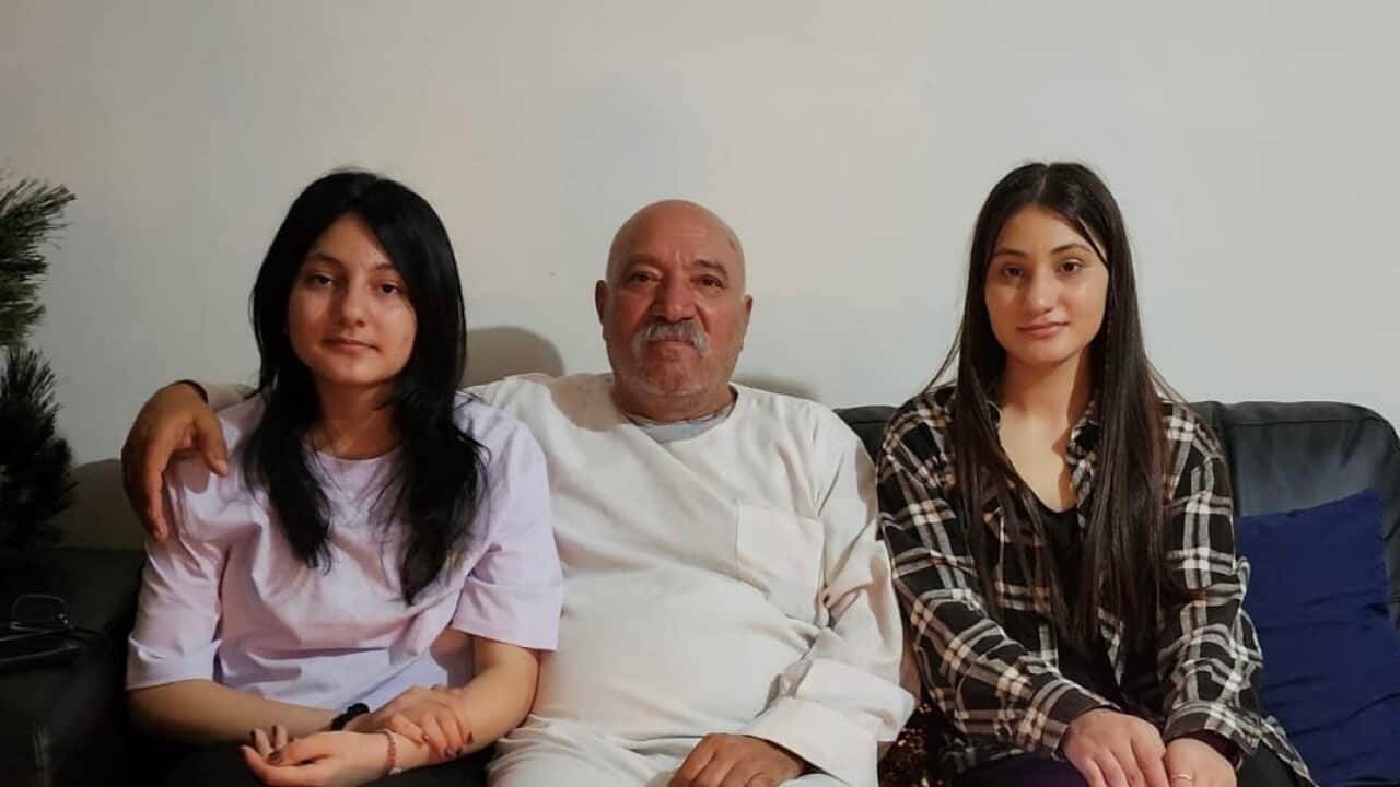 Shamo Silo with his daughters Viyan and Iman.jpeg