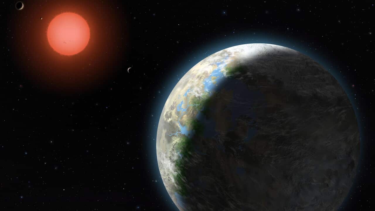 Artist's conception of the inner four planets of the Gliese 581 system and their host star, a red dwarf star only 20 light years away from Earth.