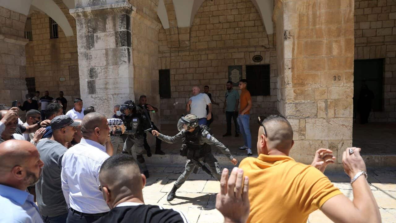 A confrontation between Israeli border police and Muslim worshippers gathered for Friday prayers at Al-Aqsa Mosque on 14 May 2021.