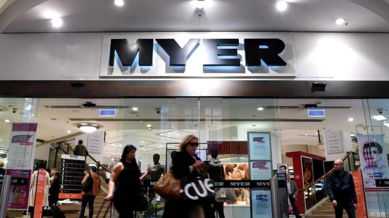 A file image of people walking outside a Myer store in Sydney.