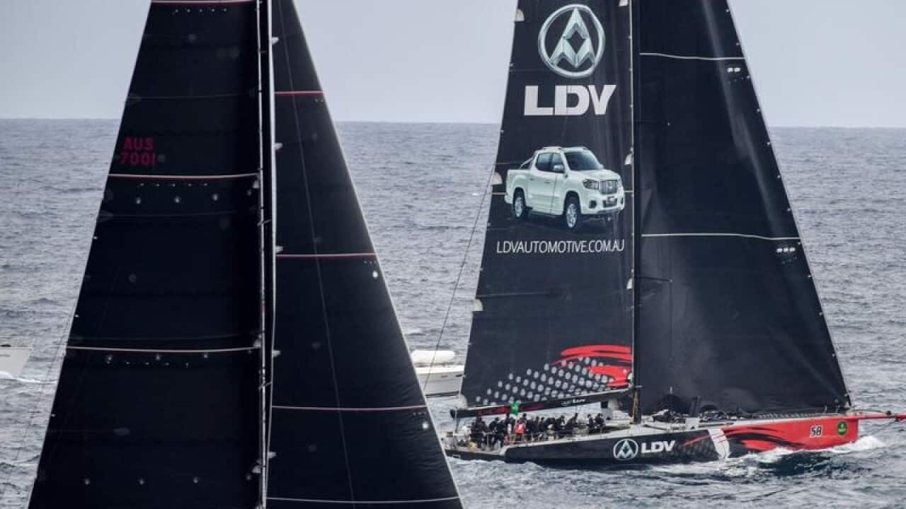 Supermaxis Wild Oats XI (L) and Comanche in the Sydney to Hobart