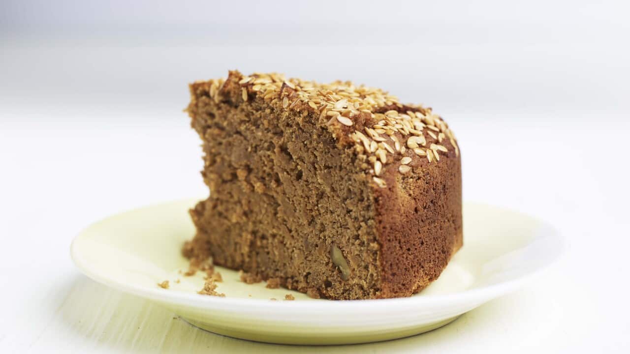 Slice of banana peel cake on a white plate