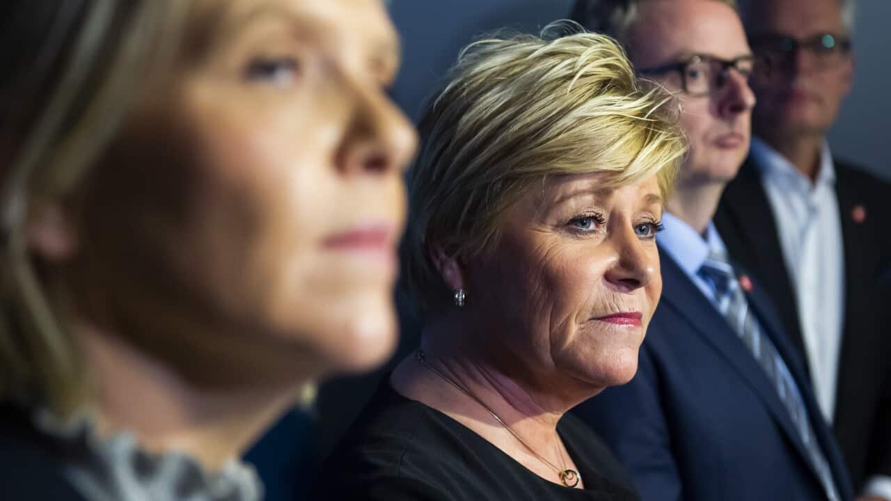 Party leader of Norwegian populist Progress Party and Finance Minister Siv Jensen (2-L) along with deputy party leaders Sylvi Listhaug (L) and Terje Soeviknes.