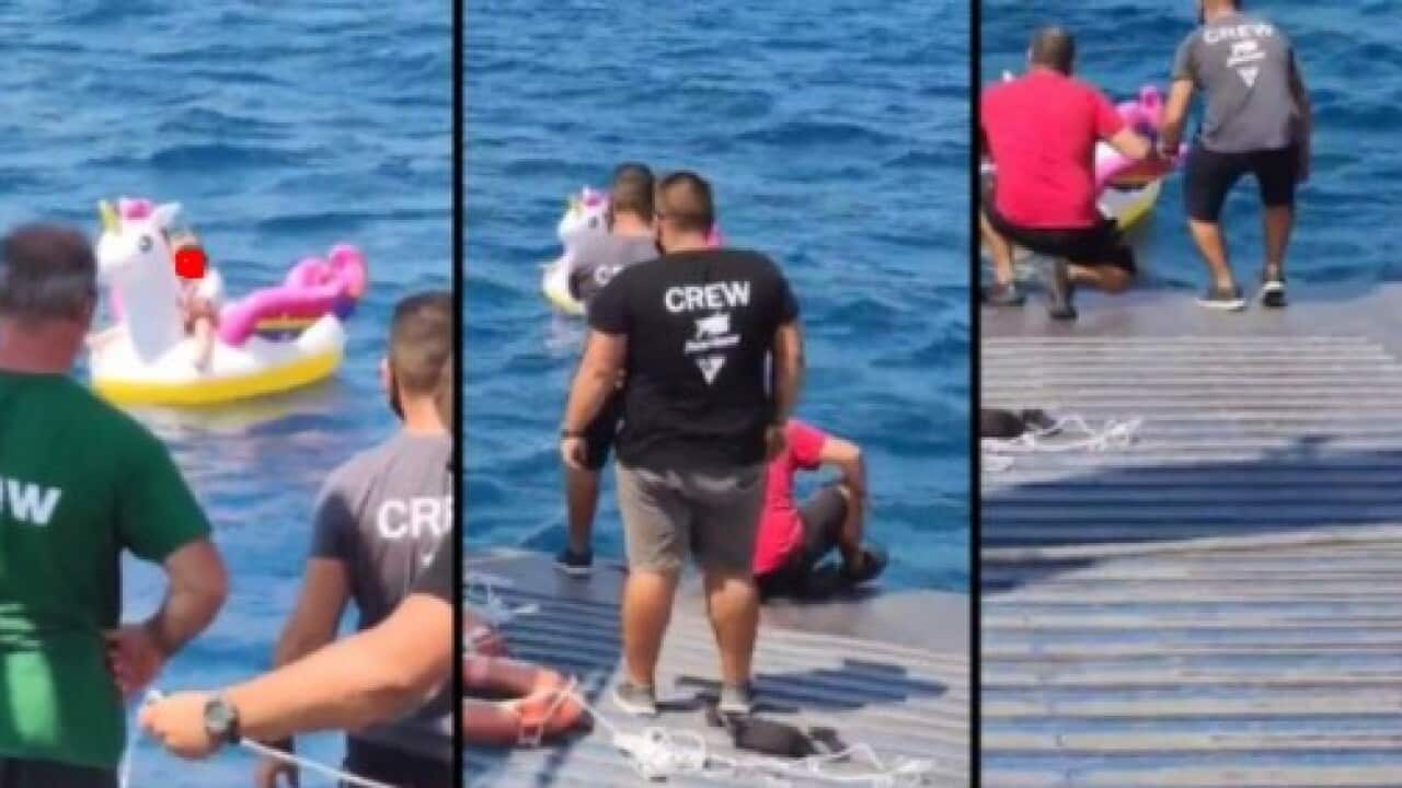 Young girl floating on unicorn saved by ferry boat