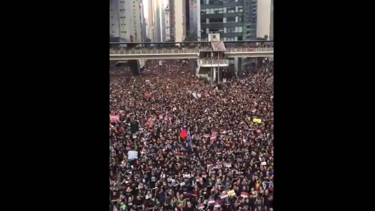 Hong Kong protesters demand Chief Executive Carrie Lam steps down over extradition bill