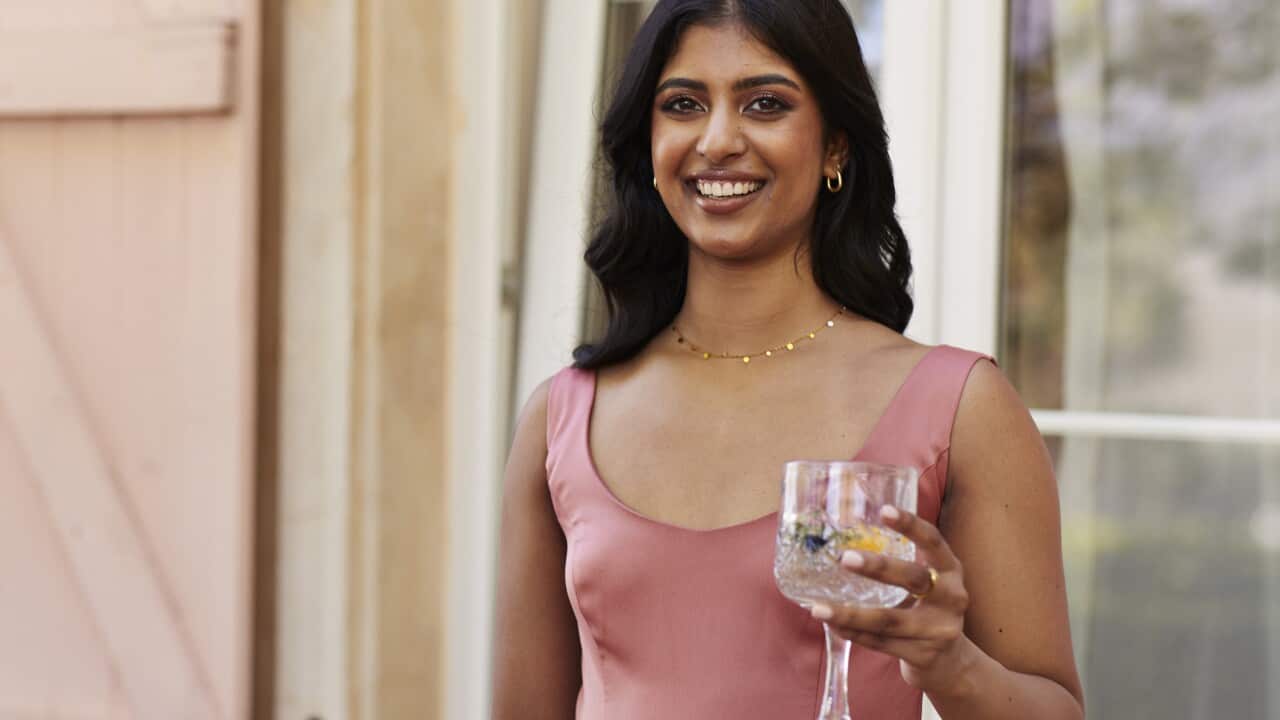 Portrait of smiling beautiful young woman