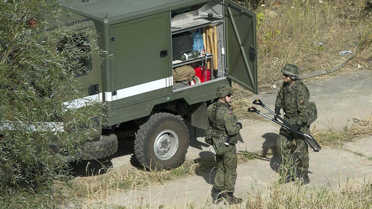 Soldiers prepare to search for a rumoured World War II 'gold train'.