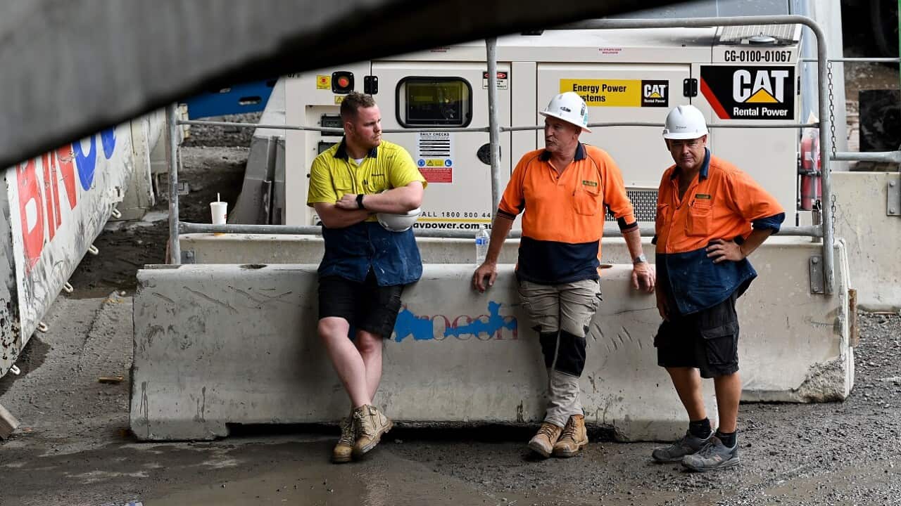 Constructions workers are seen onsite at The Ribbon project at Darling Harbour in Sydney,