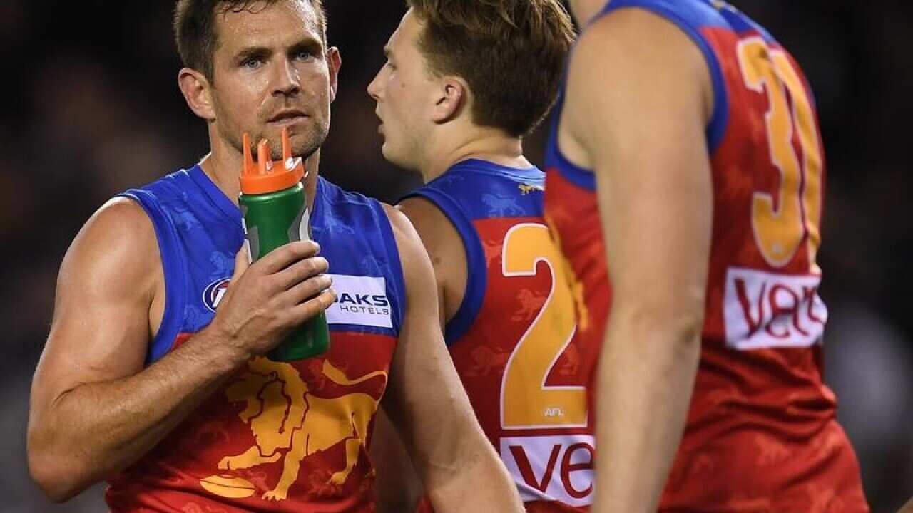 AFL MAGPIES LIONS HODGE