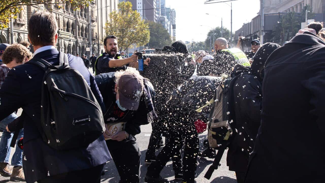 Police spraying protesters in Melbourne