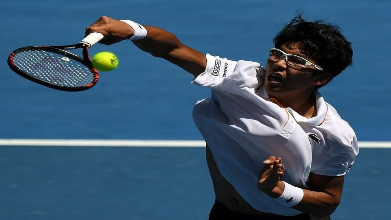 Hyeon Chung of South Korea in action against Tennys Sandgren.