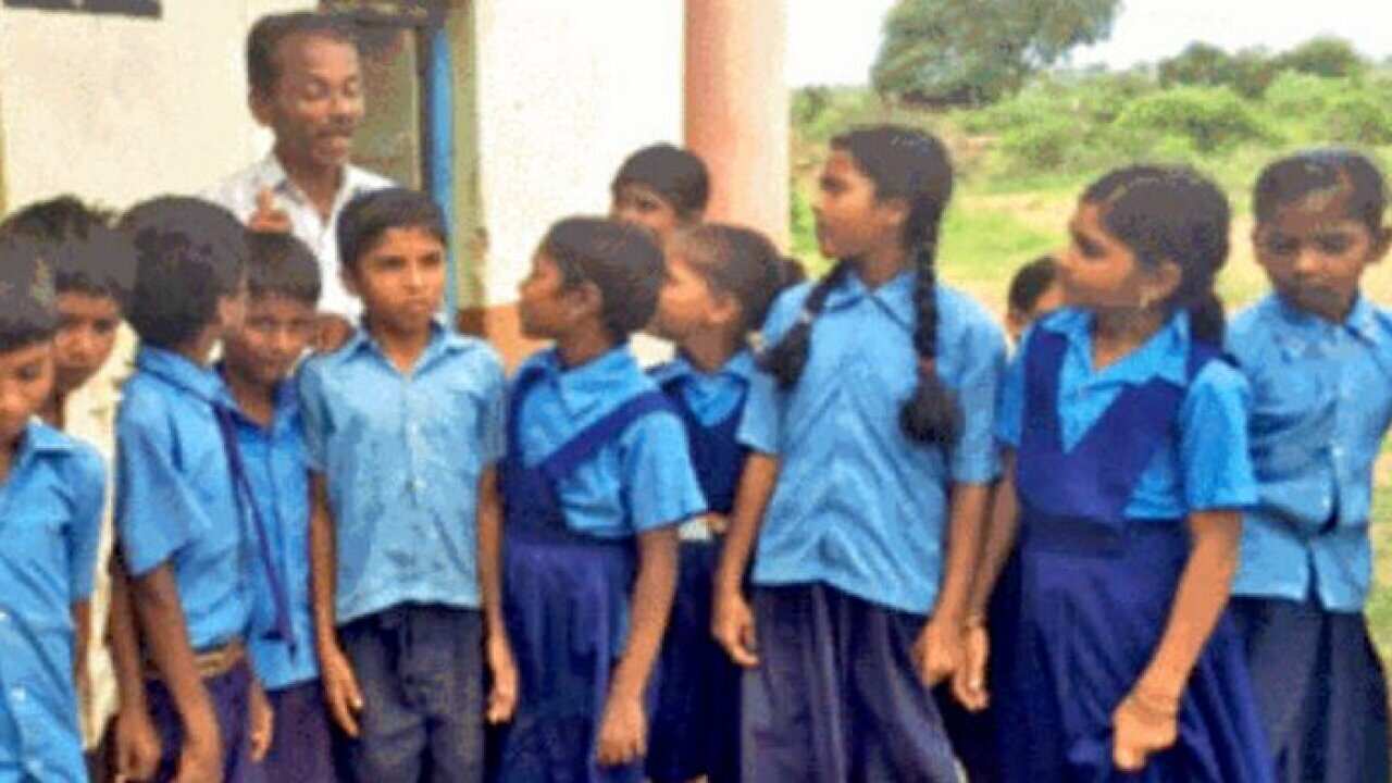 Mr. Suresh with his students
