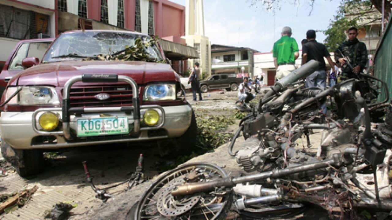 philippines_basilan_bombs_b_100413_epa_167026608