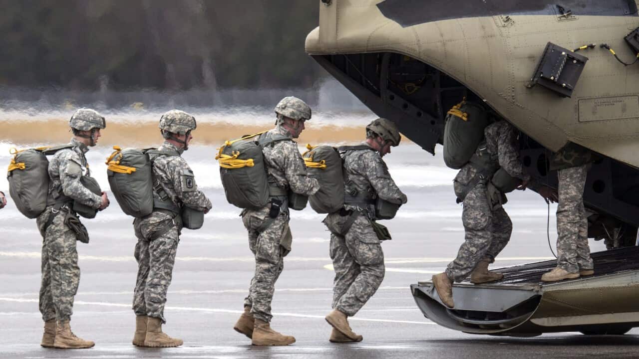 Abbott welcomes increase of US troops in Iraq