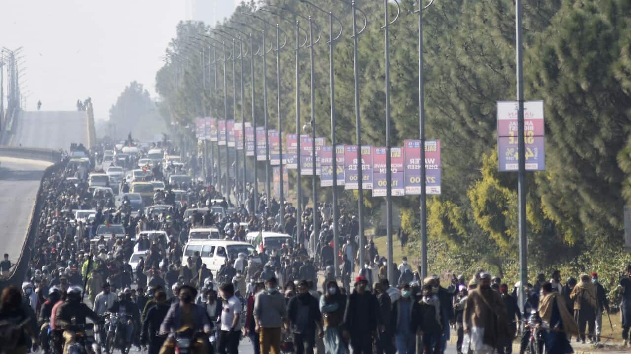 Supporters of imprisoned former premier Imran Khan's Pakistan Tehreek-e-Insaf party move towards D-Chowk square