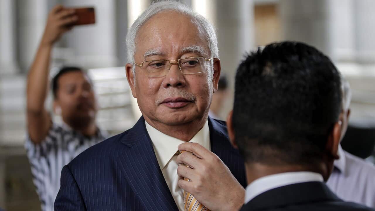 Former Malaysian Prime Minister Najib Razak leaves the High Court in Putrajaya, Malaysia, 21 March 2019