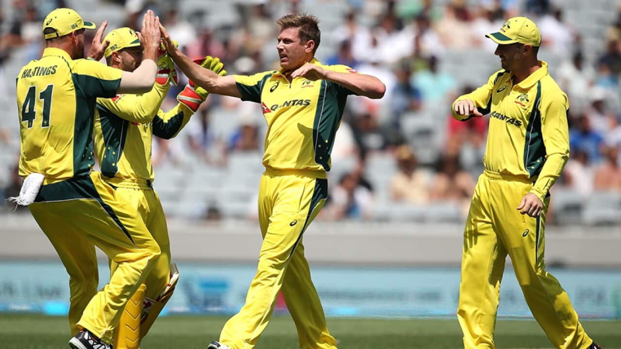 James Faulkner (C) of Australia celebrates a wicket