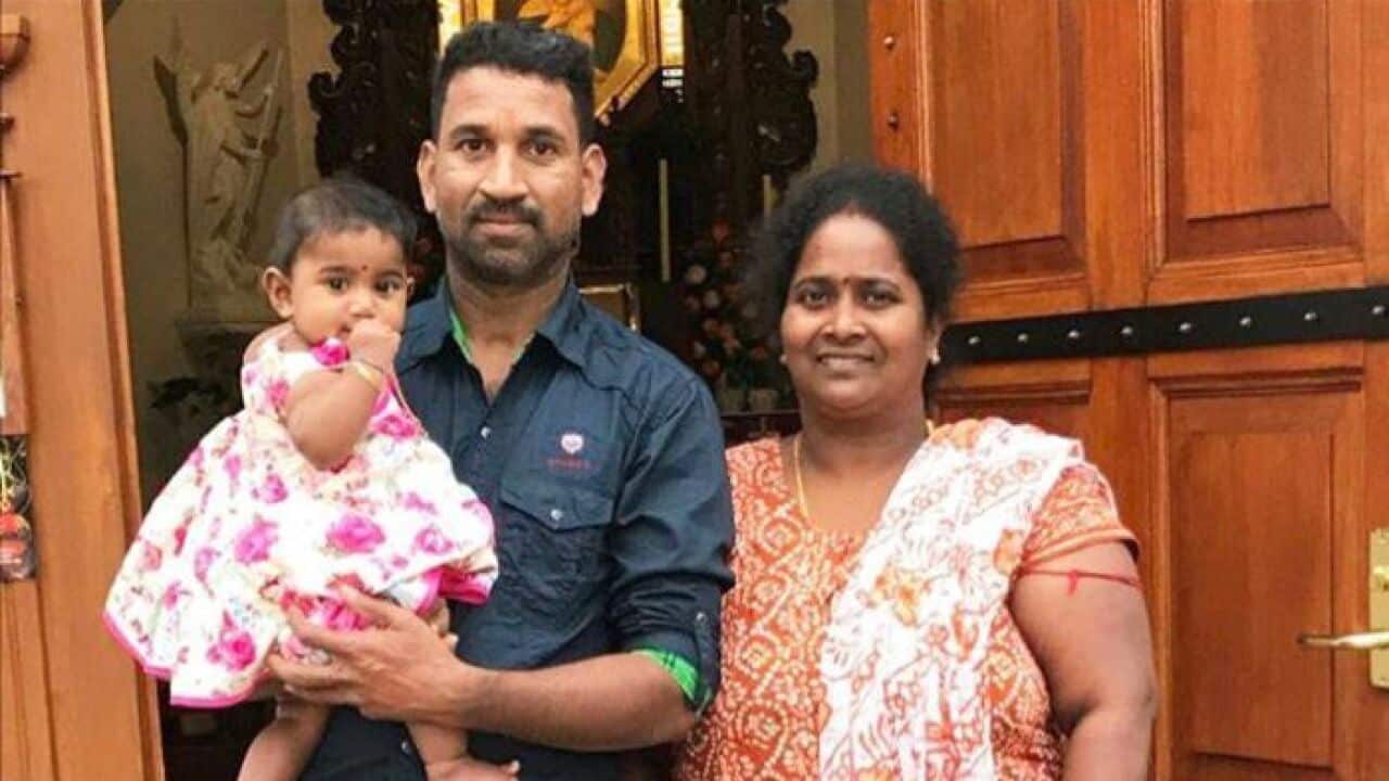 Nadesalingam and Priya with their two children. They are likely facing deportation.