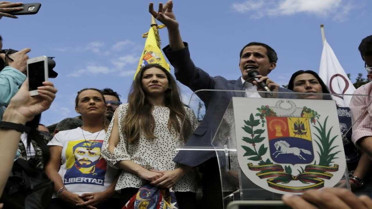 Venezuela's self-declared interim leader Juan Guaido (centre