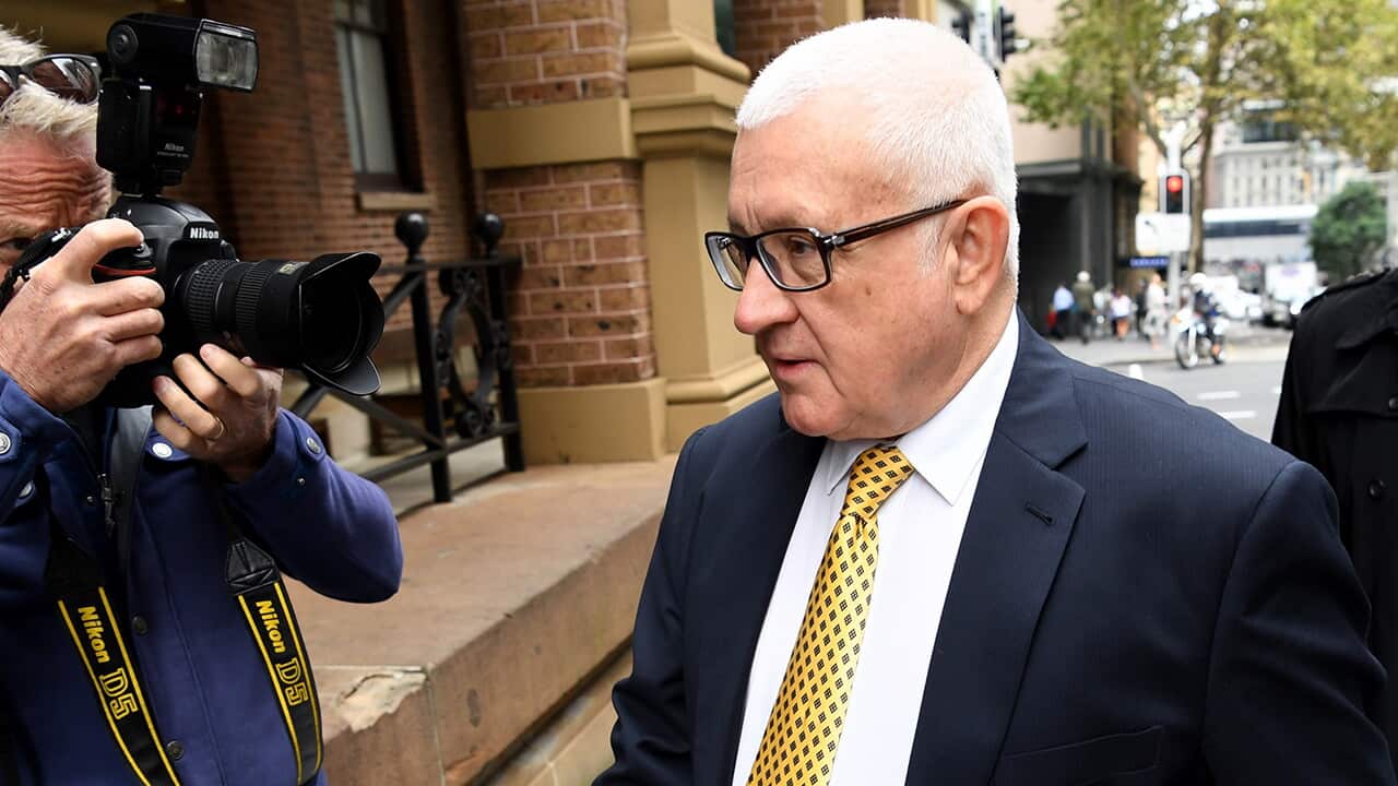 Property developer Ron Medich (centre)