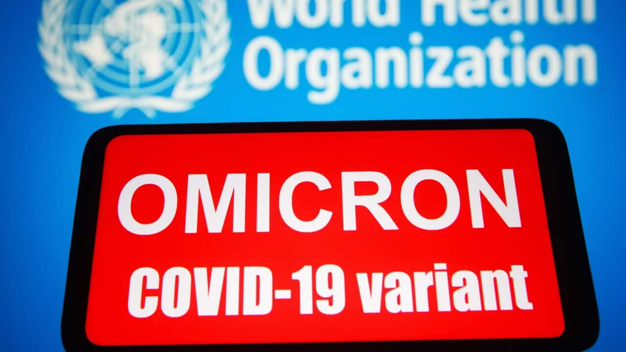 Words that say Omicron COVID-19 variant is seen on a mobile phone