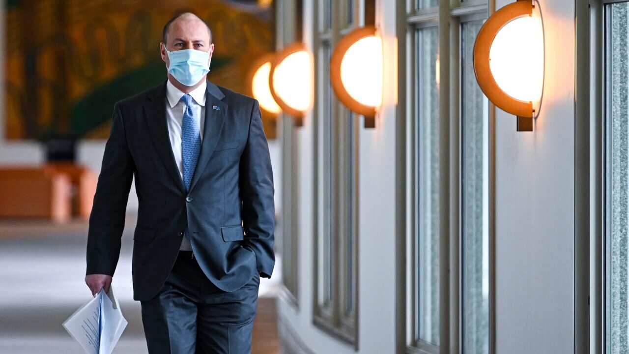 Australian Treasurer Josh Frydenberg arrives to deliver a fiscal strategy speech at Parliament House in Canberra.