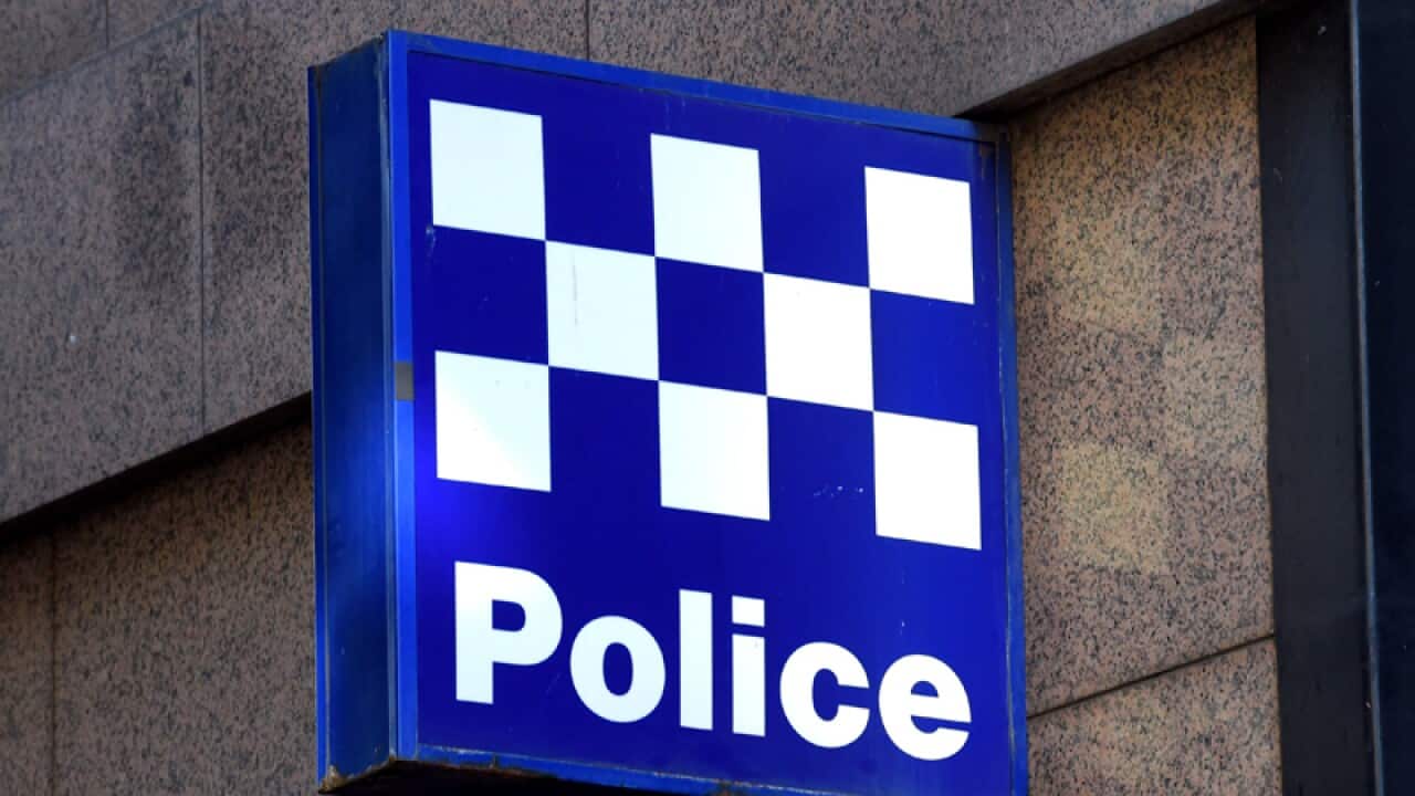 A police station sign