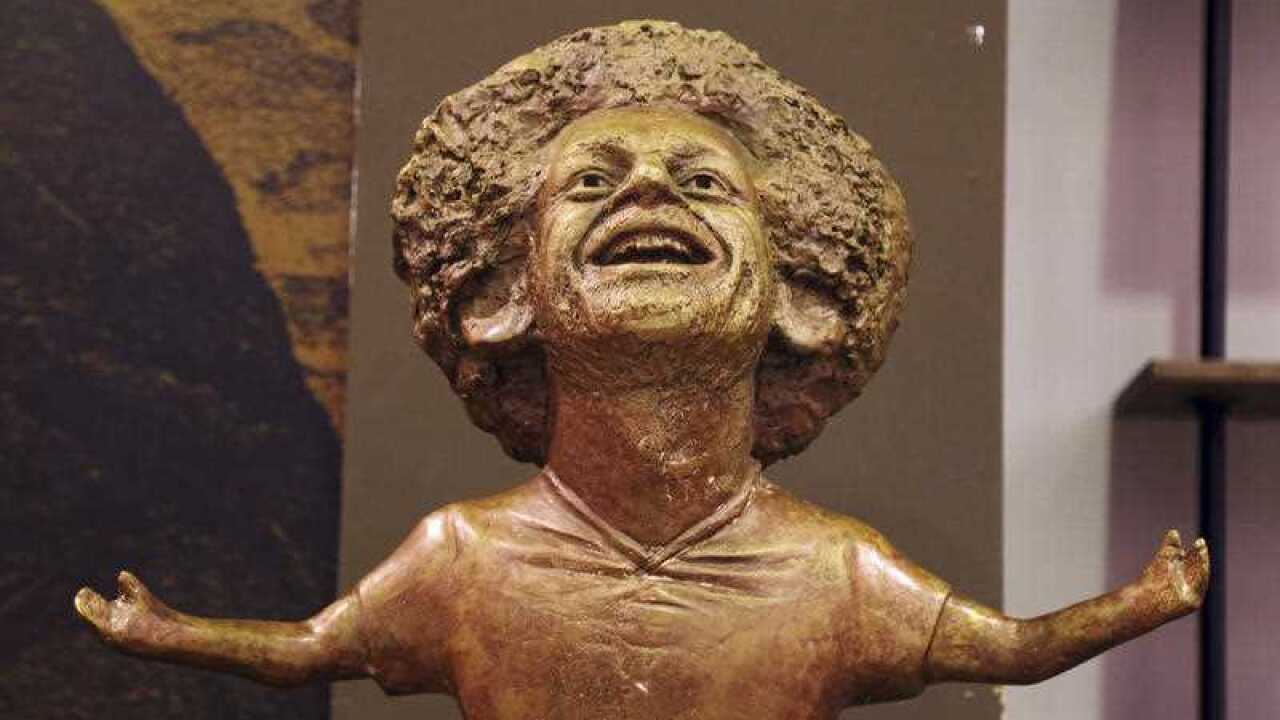 A bronze statue of Liverpool striker Mohammed Salah is on display in a conference hall at an international youths gathering, in Sharm El Sheikh, Egypt, Monday, Nov. 5, 2018.