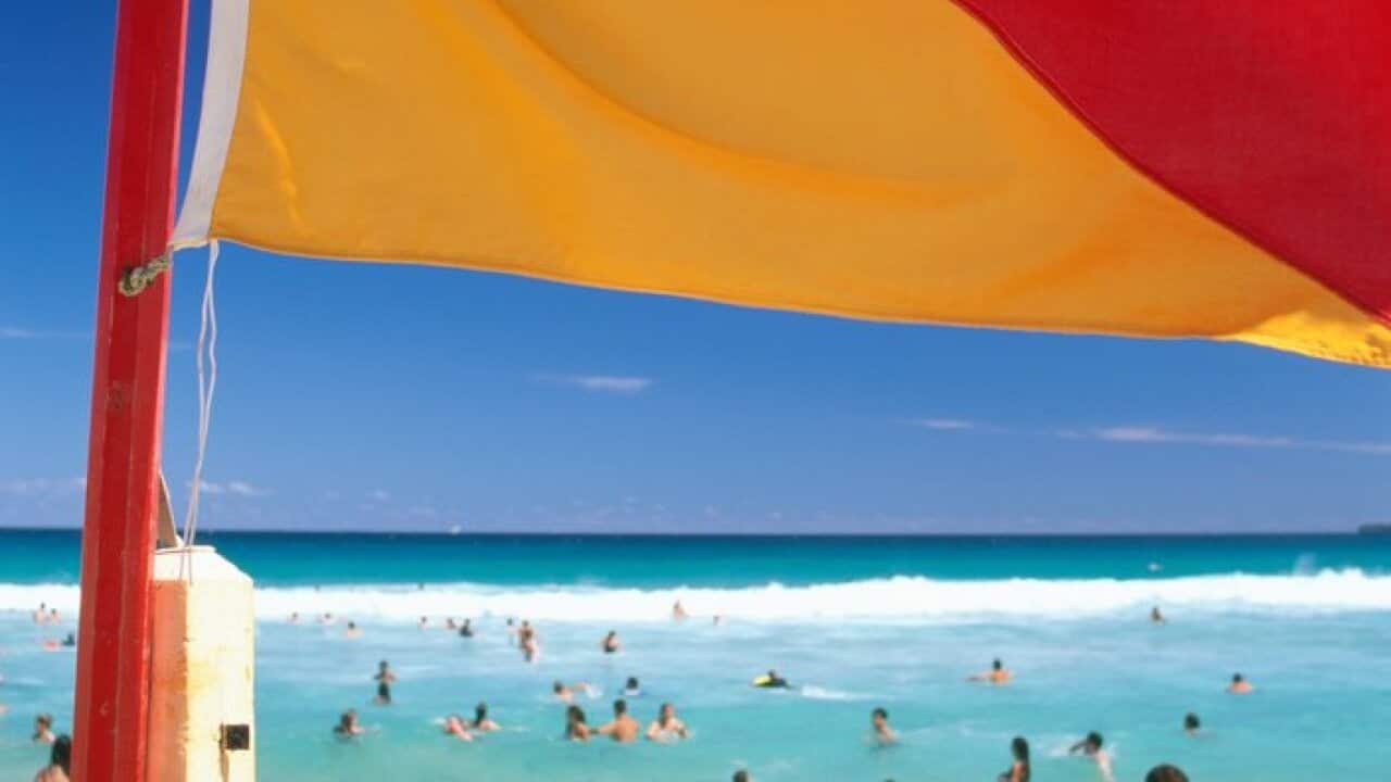 Swimming marker flag on beach