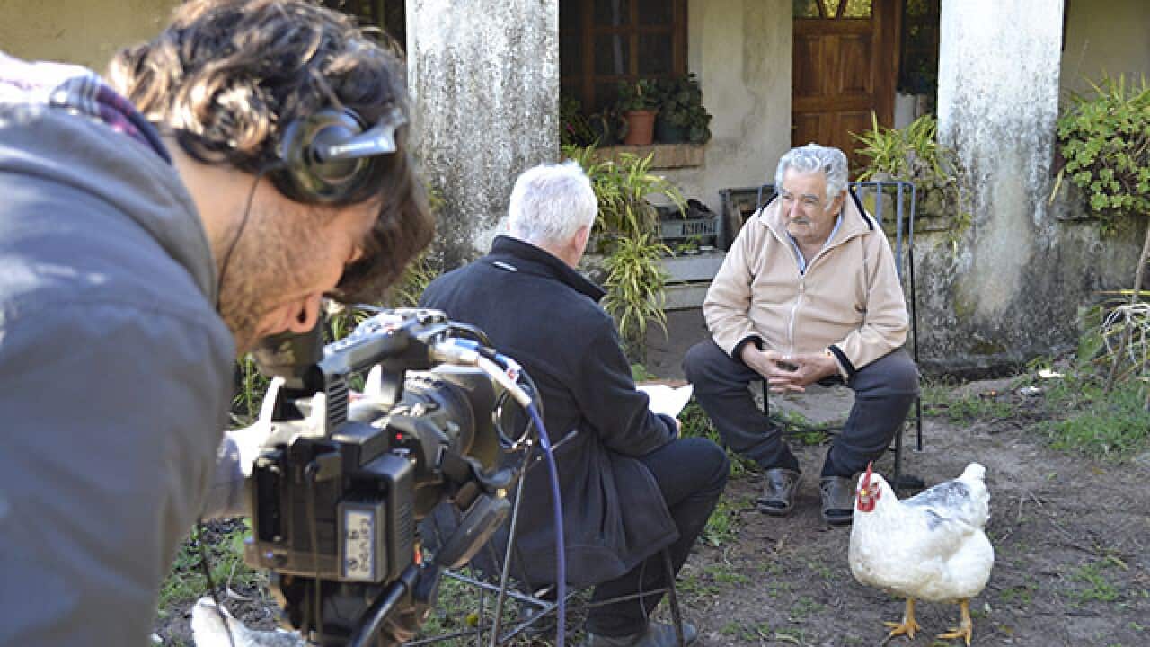 Dateline's David O'Shea interviews Uruguayan President José Mujica outside his ramshackle farmhouse.