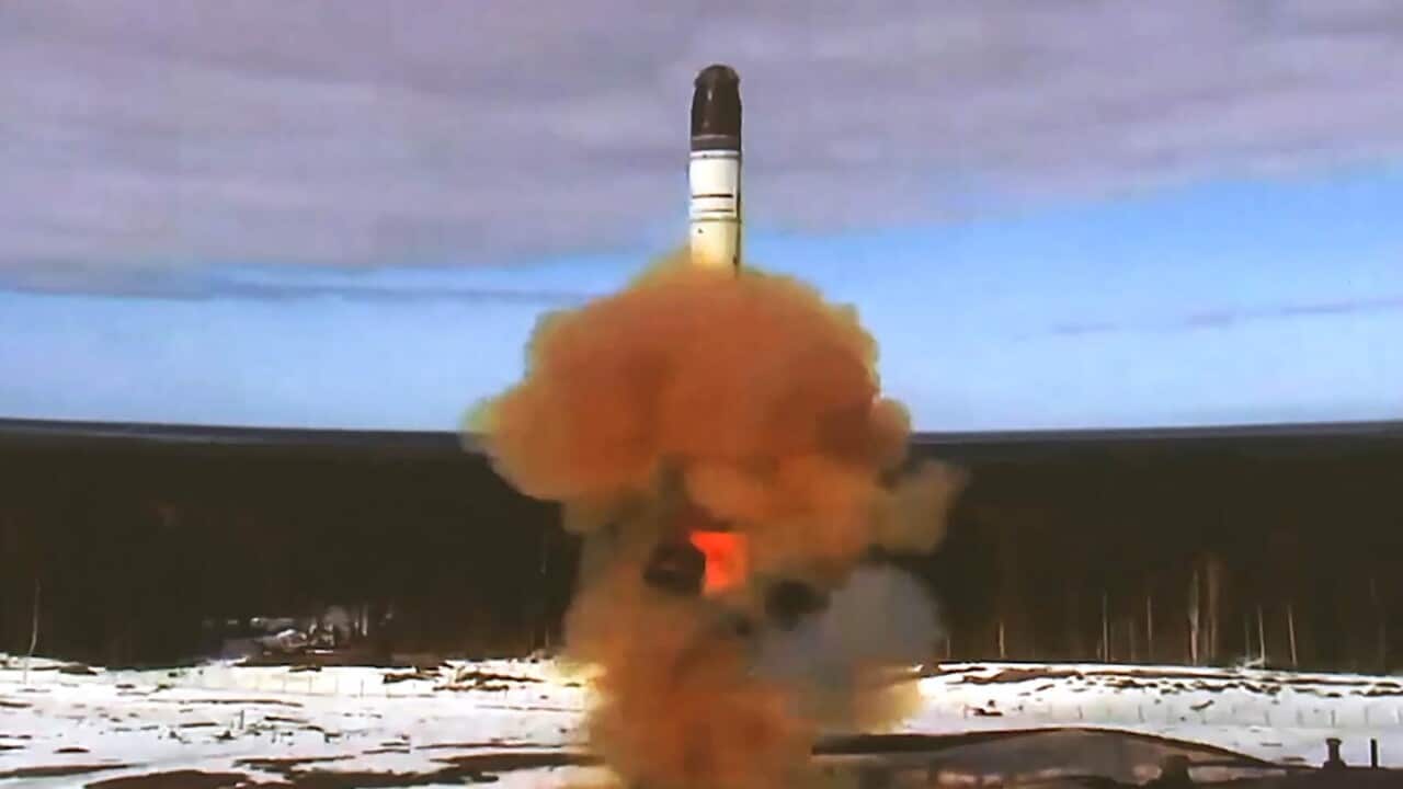 A missile blasting off.