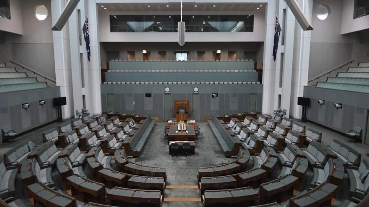 The empty chamber of the House of Representatives