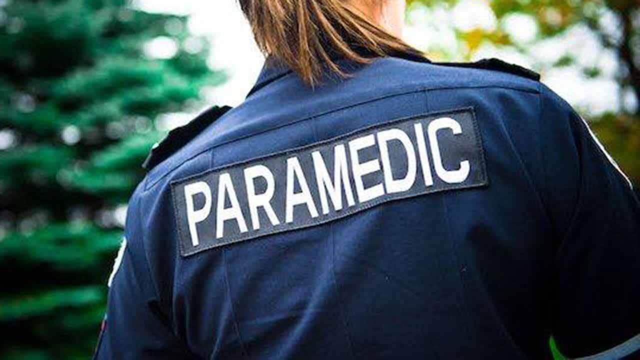 Paramedics attending to a man in western Sydney were allegedly attacked and prevented from doing their job.