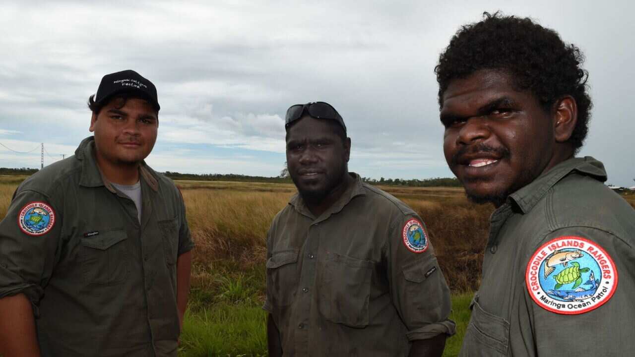 Crocodile Islands Rangers Gerard Morgan, Nail Djan and Jarrod Gingiri in the aboriginal community of Milingimbi