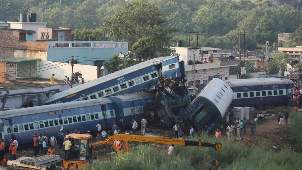 Rescue work continues at the site of a train accident
